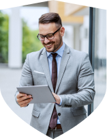 Man looking over details and smiling