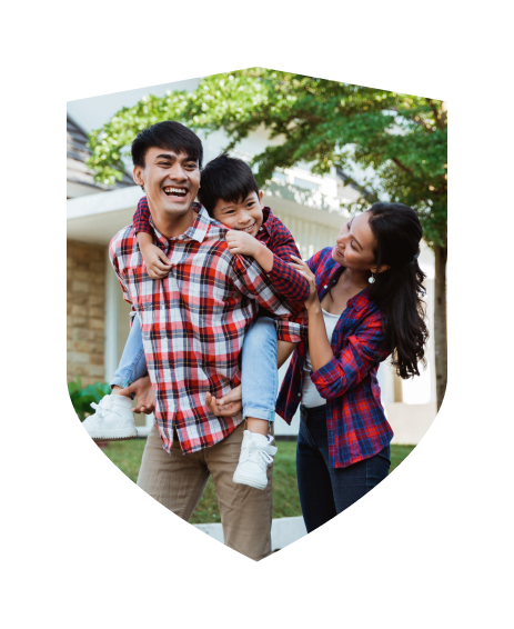 Happy family infront of their house
